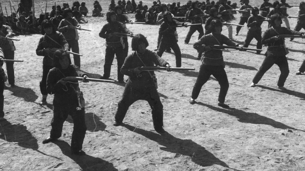 Female militia regiments of the CPC fought against the Japanese invasion in the 1940s. Here a group of female soldiers in Hebei province perform rifle drills on International Women’s Day, 1940 (Fotoe)