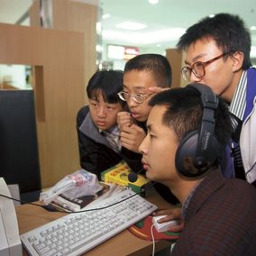 Teenagers at an internet cafe in Beijing in 1998