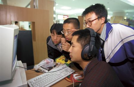 Teenagers at an internet cafe in Beijing in 1998