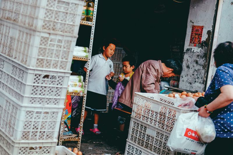 Street-side vendors, increasingly rare in Beijing&#x27;s center, line the alleys, offering low-cost necessities for residents