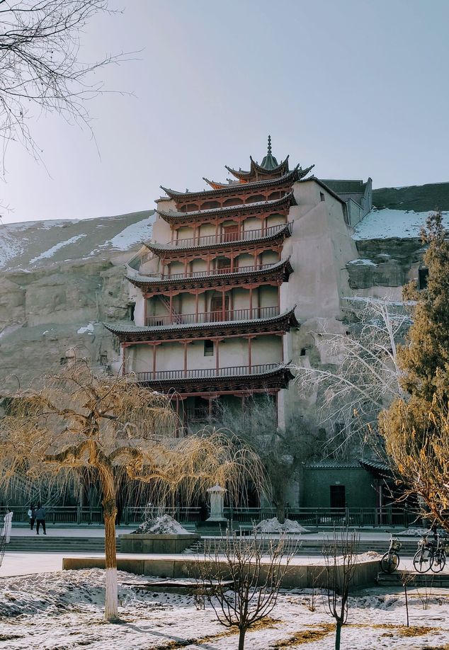 With halls and rooms carved into the cliffs, Buddhist grottos feature muti-leveled wood structure on the outside