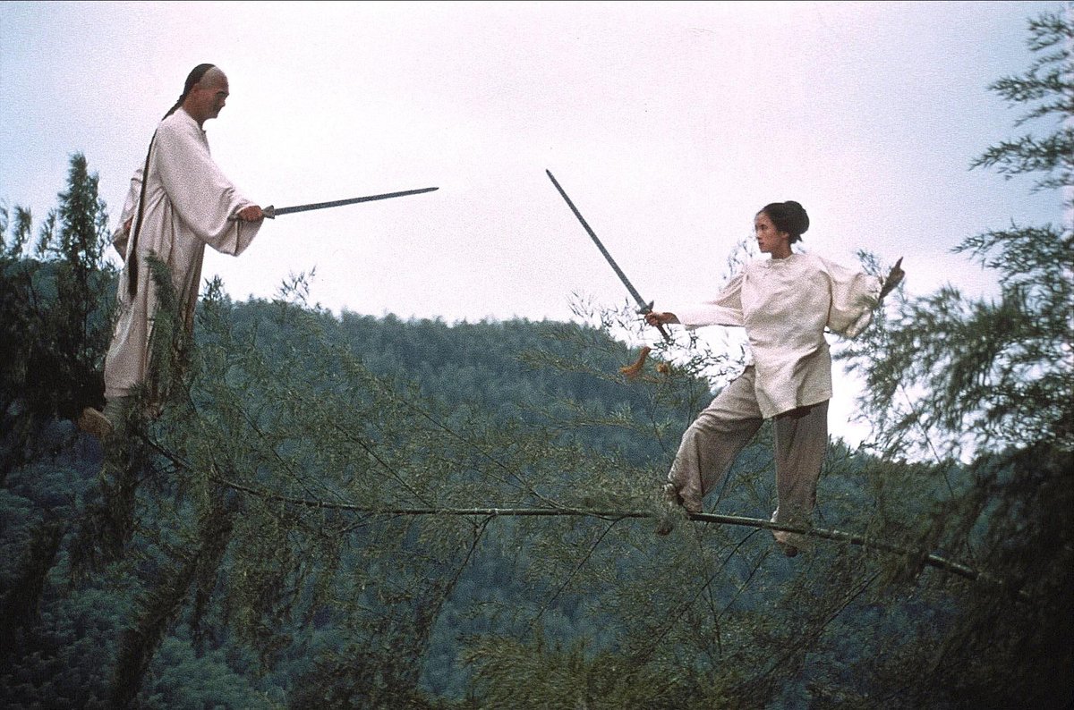 The iconic fight scene in Crouching Tiger, Hidden Dragon, filmed in the bamboo groves of Anji, Zhejiang, and Huangshan, Anhui, has turned these locations into popular tourist attractions (still from C