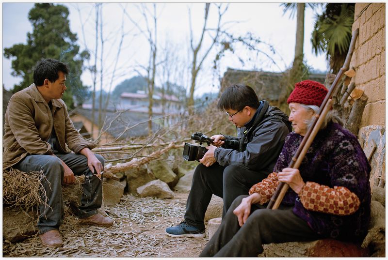 Jiang Nengjie filming for Children at a Village School (2014)