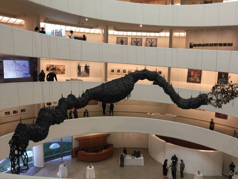 A 20-meter dragon made of bicycle tubes greets visitors as they arrive