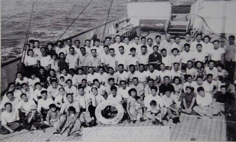 Overseas Chinese students returned from the US pose for a group photo on a ship in October, 1950. The establishment of the PRC in 1949 encouraged a wave of students, scientists, and scholars to return.