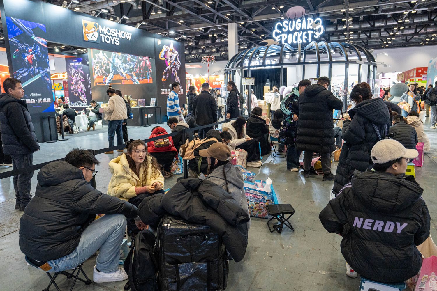 Visitors patiently wait for the sale to start