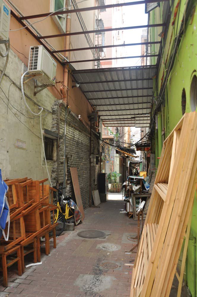 Dafen&#x27;s back alleys are clustered with artists&#x27; supplies, which authorities say are a fire hazard